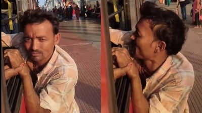 Instead of letting the suspected thief go as the train started moving, the passengers held on to him. (Screenshots from video/X) Instead of letting the suspected thief go as the train started moving, the passengers held on to him. (Screenshots from video/X)