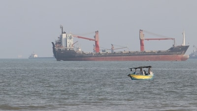 A boat floats as commercial vessels appear anchored in the Strait of Hormuz off Bandar Abbas, Iran, Oct. 13, 2026. (Razieh Poudat/ISNA via AP) (AP Photo/Razieh Poudat) A boat floats as commercial vessels appear anchored in the Strait of Hormuz off Bandar Abbas, Iran, Oct. 13, 2026. (Razieh Poudat/ISNA via AP) (AP Photo/Razieh Poudat)