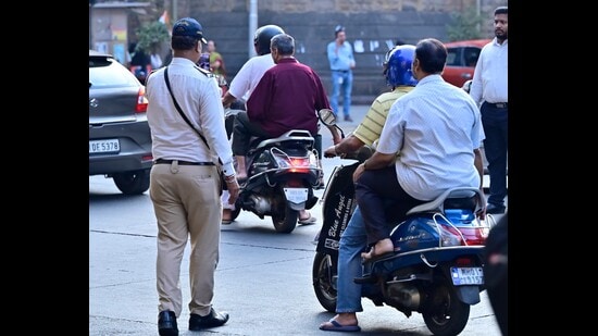 A 10-second video clip, reportedly captured by a car’s dashboard camera, showed at least three motorcyclists skidding on the freshly painted carriageway of the flyover while it was drizzling. (HT Photo)