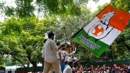 The party workers alleged that BJP women workers had disrespected the Congress flag and waved their party flag inside the Congress office premises. (ANI Photo/ Ritik Sharma)