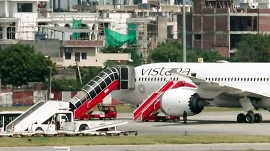 A view of the Frankfurt-to-Delhi Air India flight AI2030 at the Jaipur International Airport following its diversion due to a security threat, in Jaipur on Wednesday. Further probing is underway. (ANI Video Grab)
