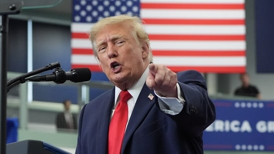 Trump posts bizarre AI video recreating Yorkshire tiger attack, showing POTUS wrestling the animal before hugging it (AP/PTI) (AP10_14_2026_000004B)