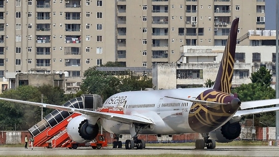 Air India AI2030, operated with a Boeing 787-9 aircraft bearing Vistara's livery, is seen at the isolation bay after making an emergency landing at the Jaipur International Airport following a hijack alert, in Jaipur, Rajasthan.