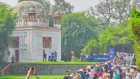 Rory McIlroy tees off on the fourth hole of Delhi Golf Club.