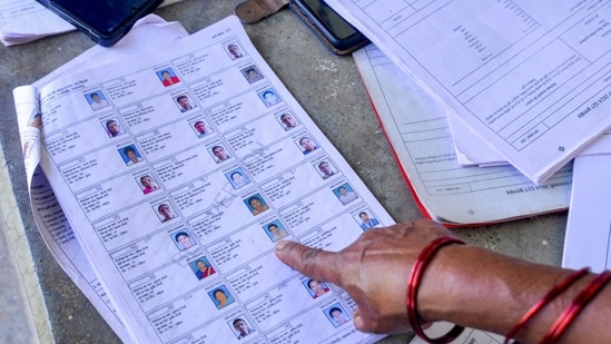 Booth Level Officers (BLOs) cross check voter list ahead of Special Intensive Revision (SIR), in Ranchi, Jharkhand. (PTI)