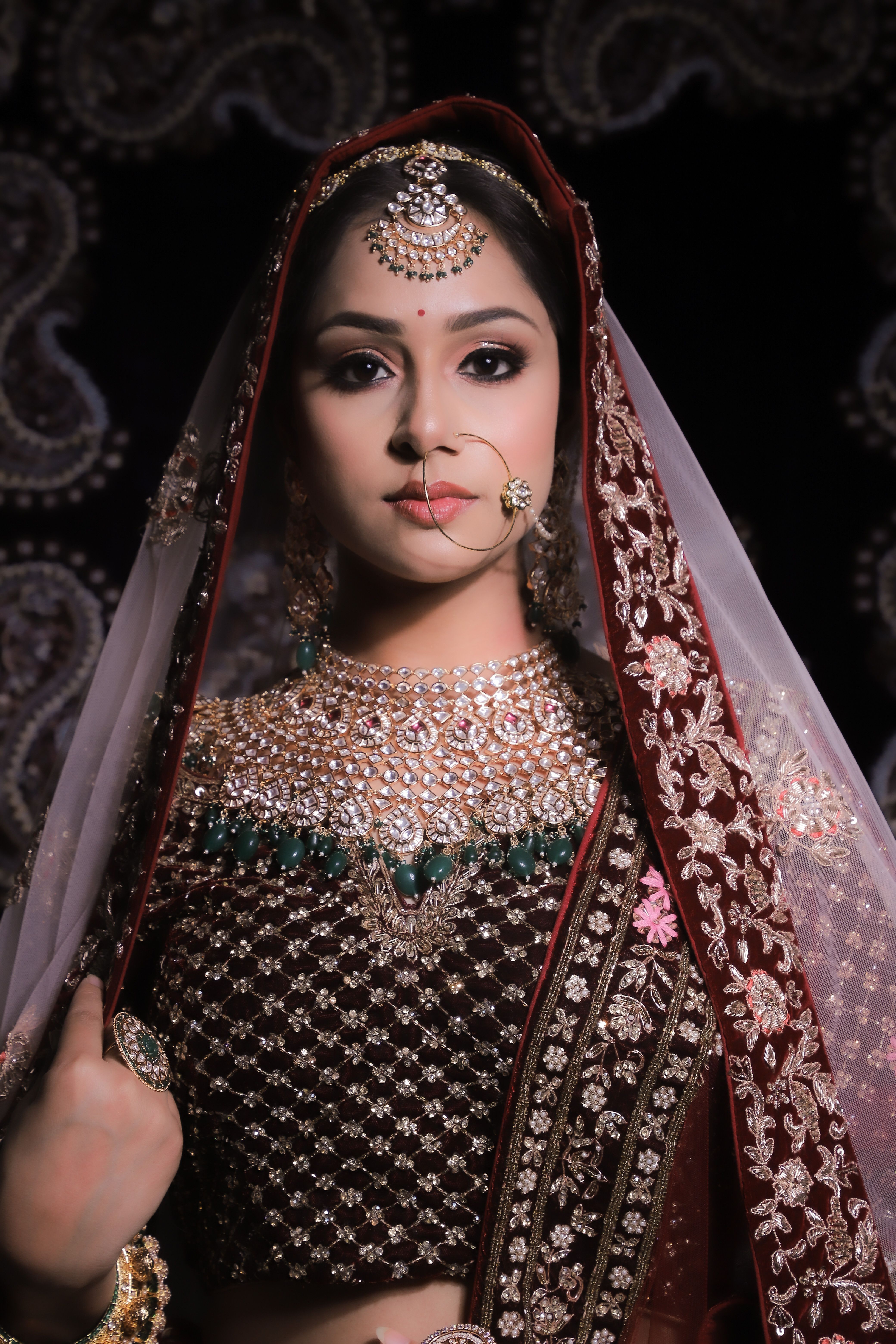 Red is a classic colour choice for Karwa Chauth, a symbol of love and tradition. (Pexel) Red is a classic colour choice for Karwa Chauth, a symbol of love and tradition. (Pexel)