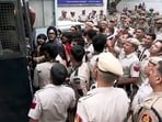 New Delhi, Oct 10 (ANI): Delhi Police detain protesters near Connaught Place amid the CJP protest, in New Delhi on Saturday. (ANI Video Grab)
