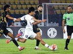 Players vie for the ball during the Indian Super League match between NorthEast United FC and Mohun Bagan Super Giant at Indira Gandhi Athletic Stadium in Guwahati earlier this week.