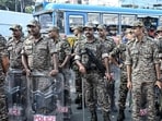 Central Reserve Police Force (CRPF) personnel stand guard during a protest by the All India Trinamool Congress (TMC) party demanding the resignation of tthe country's chief election commissioner Gyanesh Kumar over alleged voter roll irregularities linked to the special intensive revision , in Kolkata on October 13 (AFP FILE)