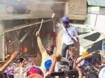 District authorities demolish a portion of the house belonging to Ashwani Kumar, the medical store owner who fatally shot anti-drug activist Parvinder Singh alias Jhota in broad daylight, in Mansa on Wednesday. (PTI)