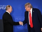 US President Donald Trump (R) and Russian President Vladimir Putin shake hands at the end of a joint press conference after participating in a US-Russia summit on Ukraine at Joint Base Elmendorf-Richardson in Anchorage, Alaska, on August 15, 2025. 