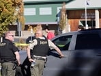 Emergency personnel work at the scene following a shooting at Silver Rail Elementary School in Bend, Oregon.
