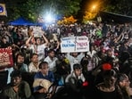 People participate in a protest against the alleged NEET-UG paper leak and examination irregularities at Jantar Mantar, in New Delhi.