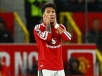 Manchester United's Lisandro Martinez looks dejected. 