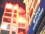 The fire broke out around 11.30 pm on Tuesday in the B wing of Imperial Heritage on the Nalasopara-Vasai Link Road, and took nearly six hours to extinguish, officials said. (Azim Tamboli/HT Photo)