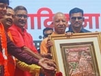 UP CM Yogi Adityanath at an event held to fete sanitation workers in Varanasi on October 15. (HT photo)