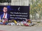 A memorial display for slain conservative activist Charlie Kirk outside the Turning Point Action Burke Family Victory Center in Phoenix, Arizona, U.S., September 13, 2026, after a newly installed memorial statue of slain conservative activist Charlie Kirk was vandalized overnight in Phoenix on Sunday, according to the organization that he founded. (Damon Jung/Handout via REUTERS) 