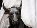 A bronze replica of a bull is seen at the gates of the Bombay Stock Exchange (BSE) building in Mumbai 