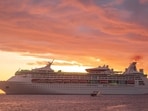 Woman found alive in sea nearly a day after going overboard from Royal Caribbean ship