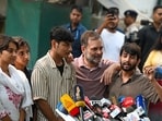 Congress MP Rahul Gandhi with NSUI protesters who were beaten during recent protests, at Janpath on Friday.