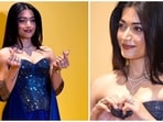 Rashmika Mandanna attends Swarovski’s Diwali celebration in a midnight-blue Amit Aggarwal saree gown. 