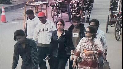 A screen grab from the purported video showing model Shraddha Dubey and her sister Rashmi at a bus station in Nepal. (Sourced)