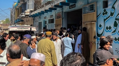 Residents gather during a search operation after a roof collapsed at a school in Peshawar on October 15, 2026. Sixteen pupils and a teacher were killed on October 15 after a roof collapsed at a school in the northwest Pakistani city of Peshawar, emergency services said. (AFP) Residents gather during a search operation after a roof collapsed at a school in Peshawar on October 15, 2026. Sixteen pupils and a teacher were killed on October 15 after a roof collapsed at a school in the northwest Pakistani city of Peshawar, emergency services said. (AFP)