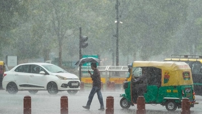 Commuters move amid heavy rainfall, in New Delhi, Thursday, Oct. 15, 2026. Rain swept across Delhi on Thursday. (Photo for representation) (PTI) Commuters move amid heavy rainfall, in New Delhi, Thursday, Oct. 15, 2026. Rain swept across Delhi on Thursday. (Photo for representation) (PTI)