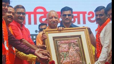 UP CM Yogi Adityanath at an event held to fete sanitation workers in Varanasi on October 15. (HT photo) UP CM Yogi Adityanath at an event held to fete sanitation workers in Varanasi on October 15. (HT photo)
