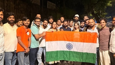 Cockroach Janta Party (CJP) founder Abhijeet Dipke along with party activists pose with the national tricolour following their release after being detained by Delhi Police near Jantar Mantar (@abhijeet_dipke)