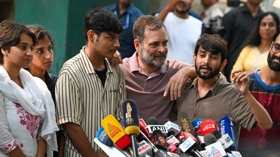 Congress MP Rahul Gandhi with NSUI protesters who were beaten during recent protests, at Janpath on Friday. (Vipin Kumar/Hindustan Times)