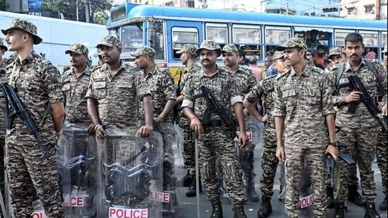Central Reserve Police Force (CRPF) personnel stand guard during a protest by the All India Trinamool Congress (TMC) party demanding the resignation of tthe country's chief election commissioner Gyanesh Kumar over alleged voter roll irregularities linked to the special intensive revision , in Kolkata on October 13 (AFP FILE)