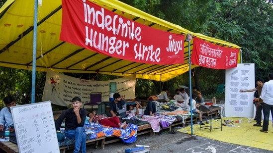 New Delhi: Jawaharlal Nehru University Students Union (JNUSU) Vice President K Gopika Babu along with office-bearers and students during an indefinite hunger strike in New Delhi, Wednesday, Oct. 14, 2026. (PTI Photo/Rushikesh More)