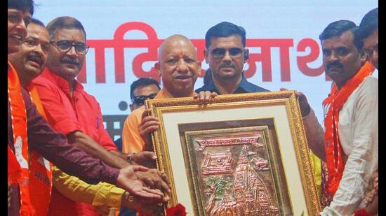UP CM Yogi Adityanath at an event held to fete sanitation workers in Varanasi on October 15. (HT photo)