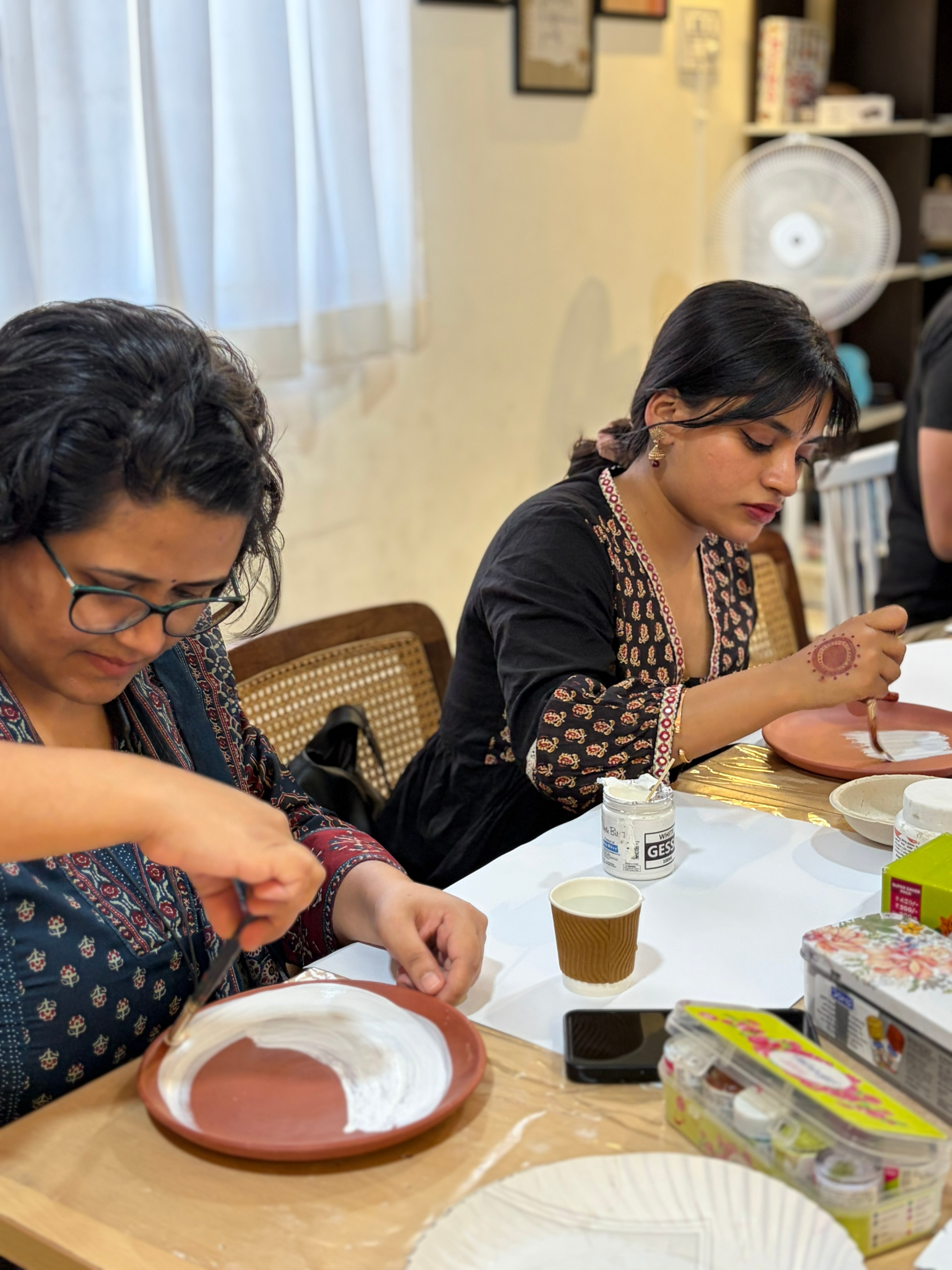 Bringing Bengali folk crafts to NCR cafes, these workshops are witnessing Delhiites enrolling to paint.