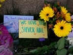 A makeshift memorial at a sign marking the Silver Rail Elementary School near a cordoned-off area, following a shooting, in Bend, Oregon, US.