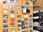 The seized ATM cards in police custody on Thursday. (HT Photo)