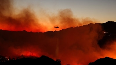 California faces fresh wildfire threat as Malibu fire spreads amid strong Santa Ana winds. (REUTERS)