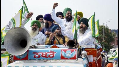 Farmers protesting during the Punjab Bandh called over the murder of anti-drug activist Parvinder Singh Jhota, in Amritsar on Thursday. (PTI Photo) Farmers protesting during the Punjab Bandh called over the murder of anti-drug activist Parvinder Singh Jhota, in Amritsar on Thursday. (PTI Photo)