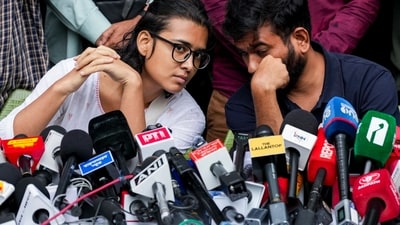 Cockroach Janta Party (CJP) founder Abhijeet Dipke and AISA President Neha Bora during a press conference at the Press Club of India, in New Delhi, Thursday, Oct. 15, 2026. (PTI)