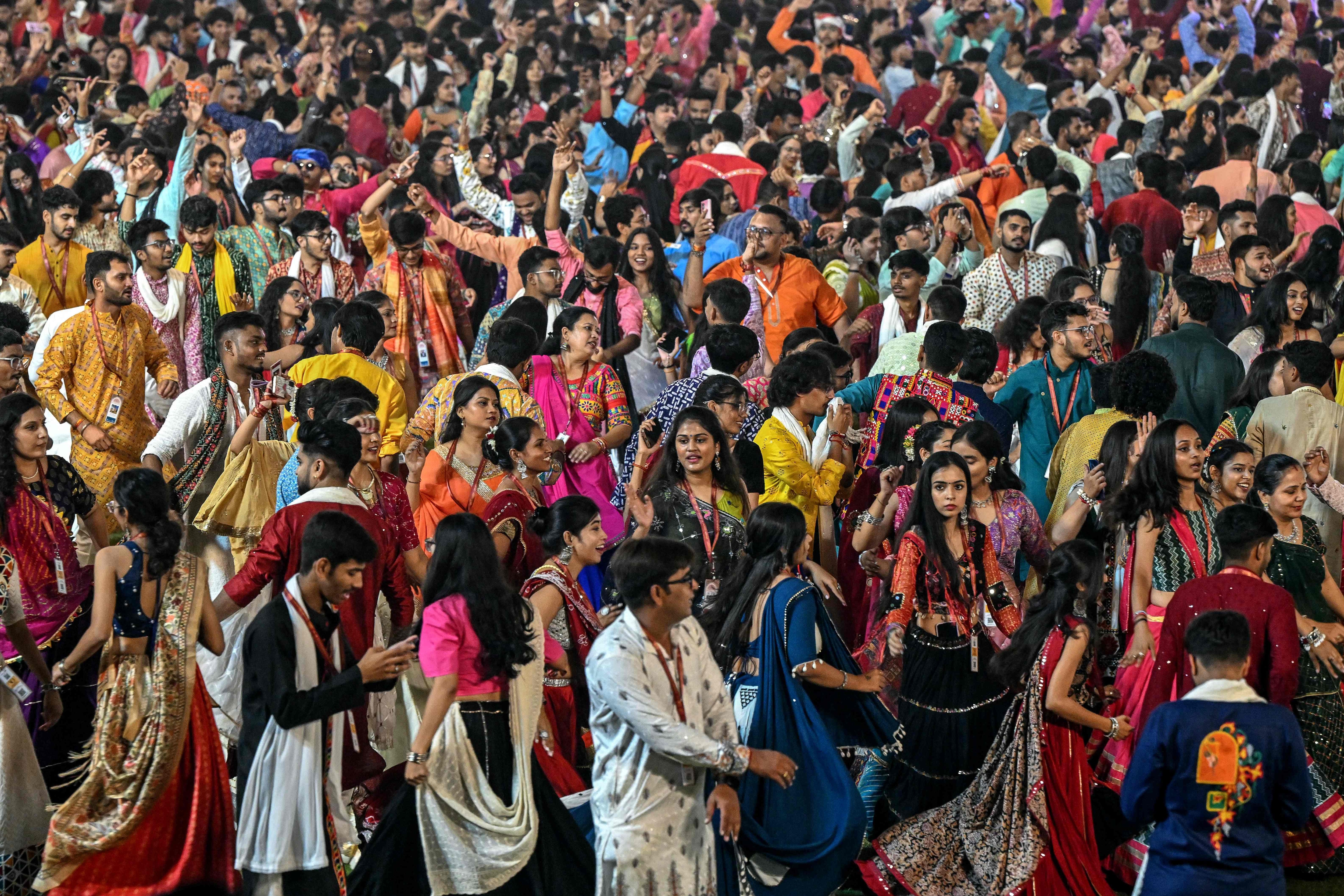 People wearing traditional dresses perform the garba dance as part of the annual Hindu festival of Navratri at the Laxmi Vilas Palace in Vadodara on October 11, 2026. (AFP) People wearing traditional dresses perform the garba dance as part of the annual Hindu festival of Navratri at the Laxmi Vilas Palace in Vadodara on October 11, 2026. (AFP)