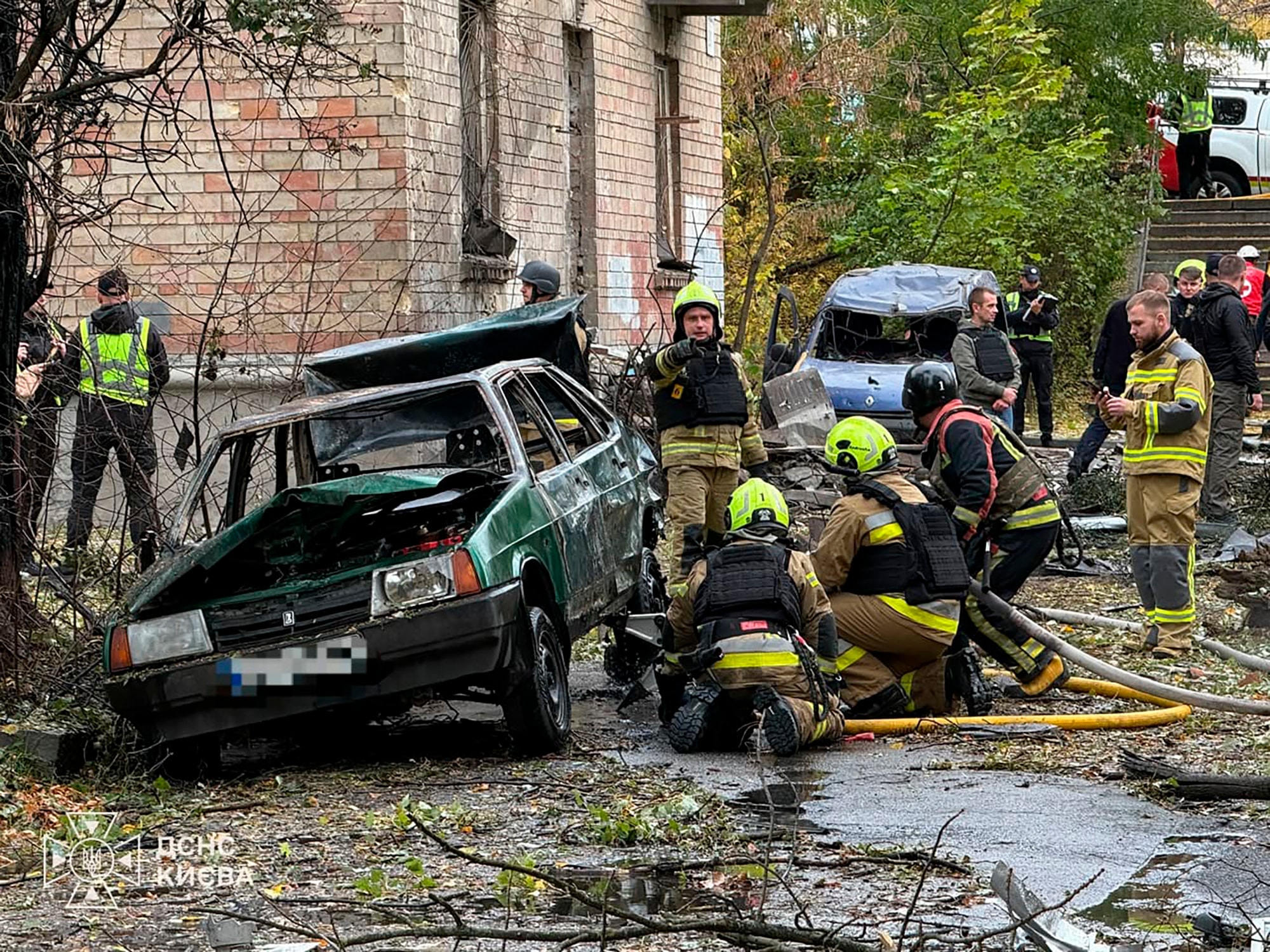 Emergency services personnel work in residential neighborhood following a Russian air attack in Kyiv, Ukraine. (Ukrainian Emergency Service via AP Photo ) Emergency services personnel work in residential neighborhood following a Russian air attack in Kyiv, Ukraine. (Ukrainian Emergency Service via AP Photo )