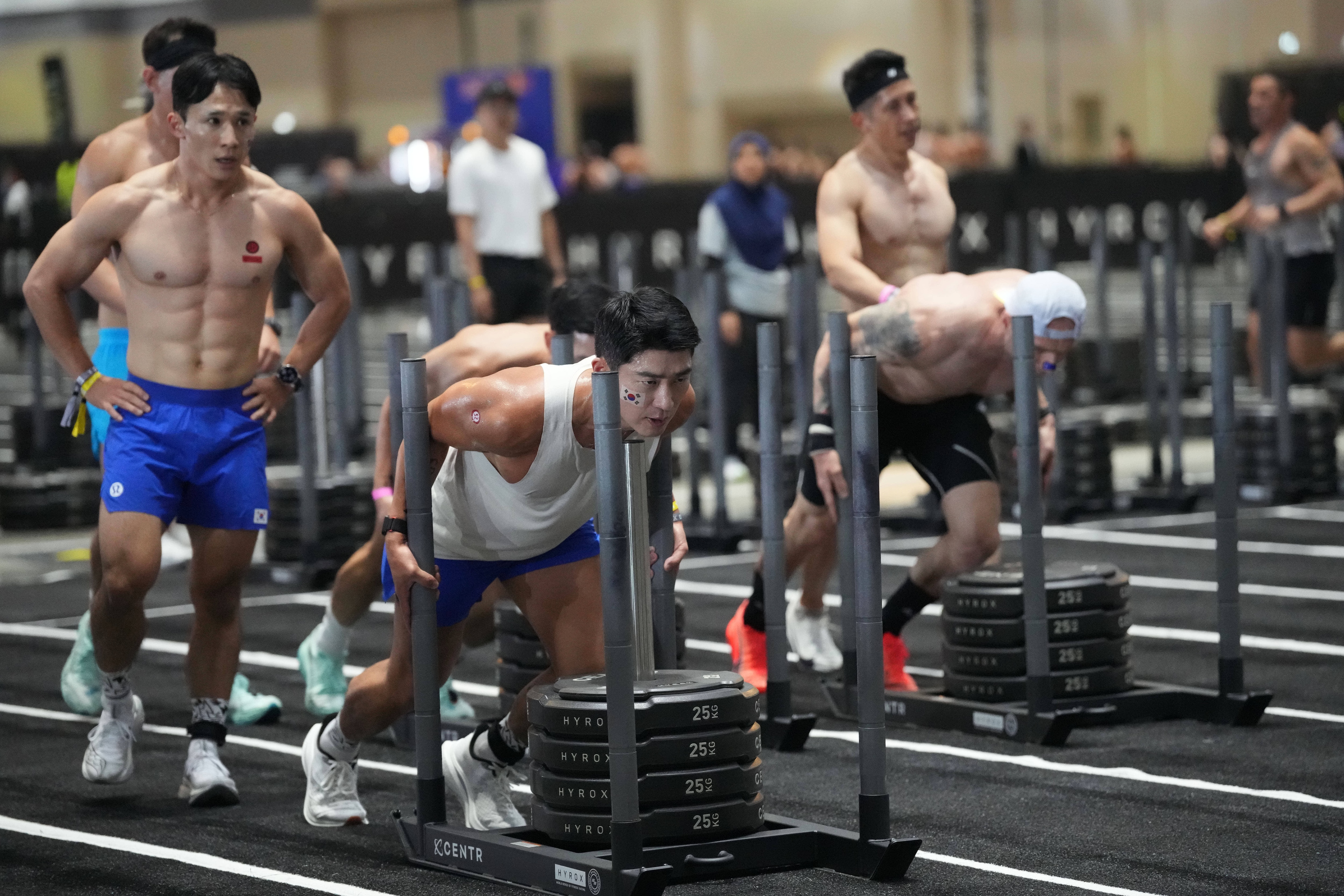 Sledge pushing and pulling, rowing, and carrying weights all demand a strong, stable core. When the core tires out, the back often ends up doing the work. (AP Photo/Sakchai Lalit) Sledge pushing and pulling, rowing, and carrying weights all demand a strong, stable core. When the core tires out, the back often ends up doing the work. (AP Photo/Sakchai Lalit)