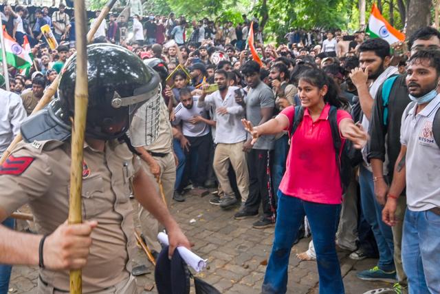 Security personnel carrying out a lathi charge during the CJP protest near Parliament House in New Delhi on July 20, 2026. (RAJ K RAJ /HT PHOTO) Security personnel carrying out a lathi charge during the CJP protest near Parliament House in New Delhi on July 20, 2026. (RAJ K RAJ /HT PHOTO)