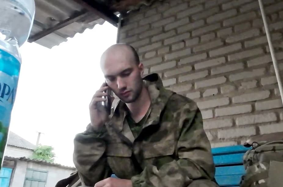 Still from a video that shows Stupnikov calling his mother just after his escape across the frontlines. He tells her: “I have come to where I was supposed to be.” (Wall Street Journal) Still from a video that shows Stupnikov calling his mother just after his escape across the frontlines. He tells her: “I have come to where I was supposed to be.” (Wall Street Journal)