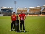 Jhye Richardson and Brendan Doggett with the BBL trophy in Chennai.