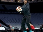 Allisha Gray was spotted warming up before tipoff and adjusting the tape on her fingers.