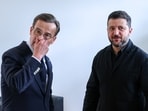 Sweden's PM Ulf Kristersson, left, meets with Ukraine's President Volodymyr Zelensky during a bilateral meeting on the sidelines of the EU summit in Brussels, Friday.