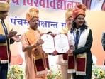 CM Yogi Adityanath at the fifth convocation of Dr Ram Manohar Lohiya National Law University, in Lucknow on Saturday. (HT Photo)