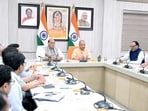 Defence minister Rajnath Singh and chief minister Yogi Adityanath during a meeting with senior officials from several departments, in Lucknow on Saturday. (Sourced)
